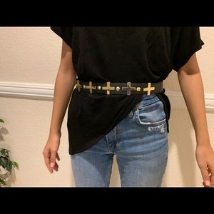 Black and gold cross belt